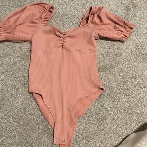 Pink bodysuit